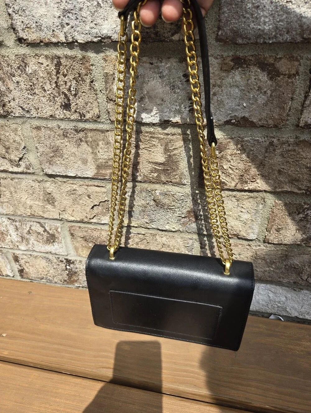 Structured Black Shoulder Bag with Gold Hardware